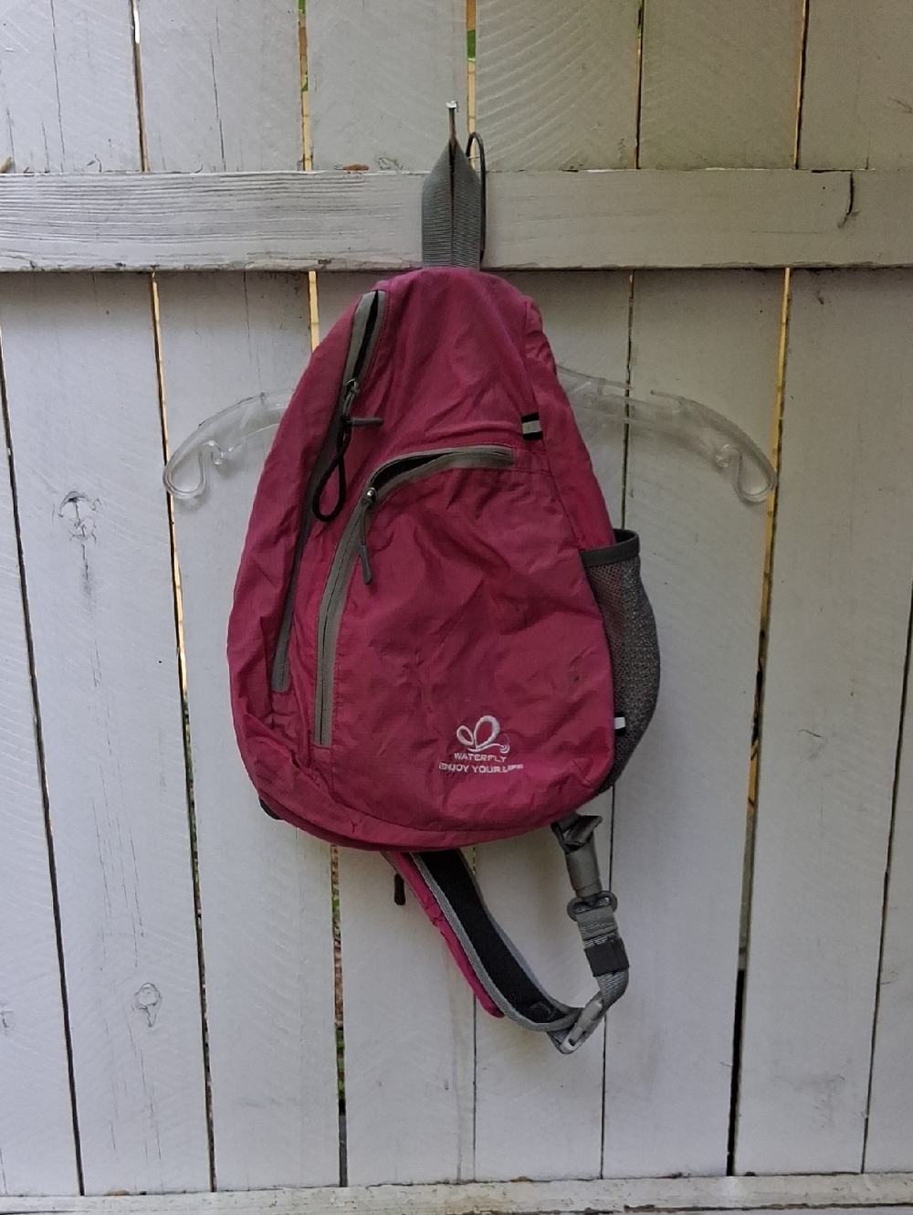 Sling Backpack with Front Zip Pocket